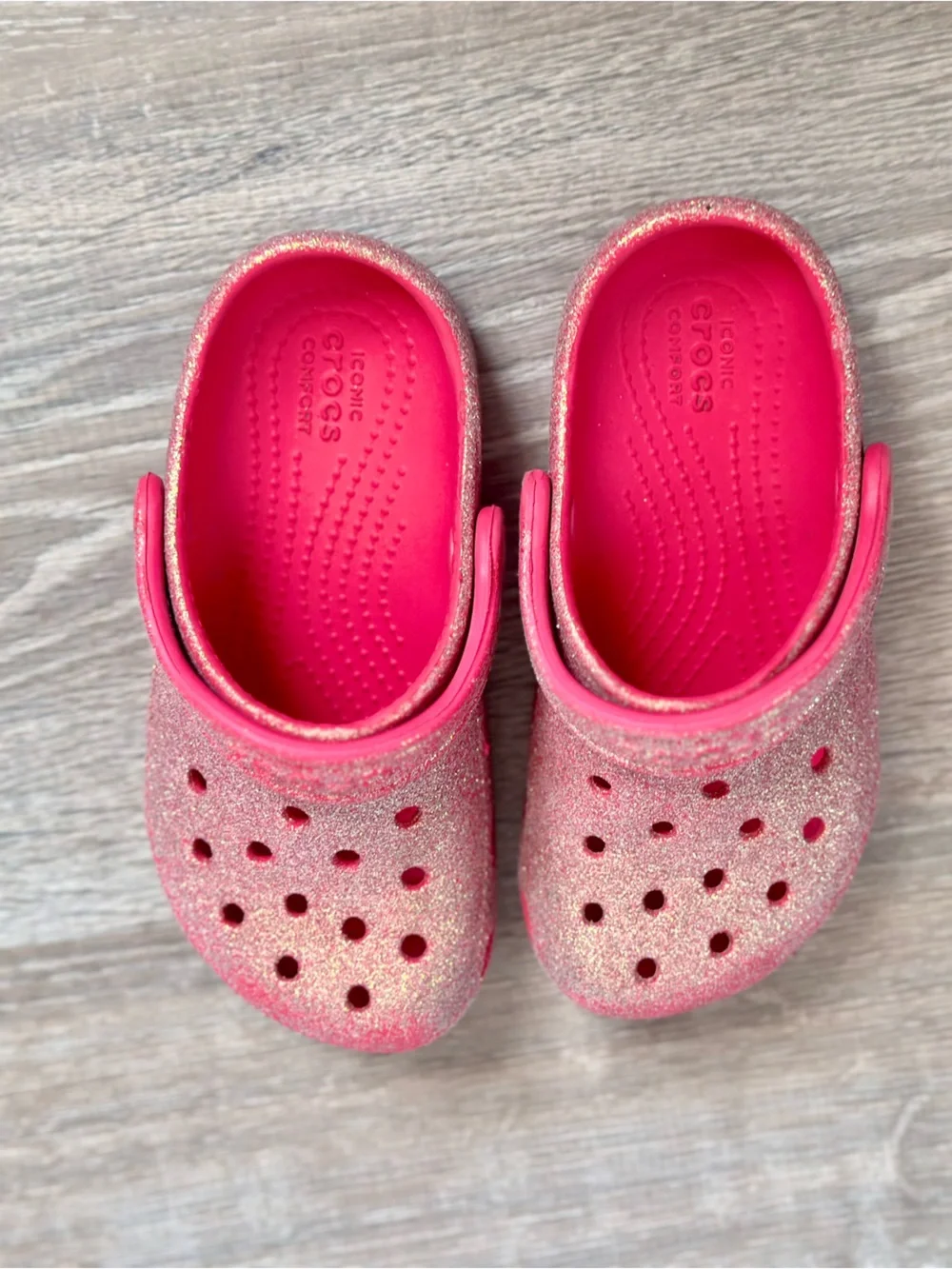 CROCS Kids Sparkle Clogs in Hot Pink